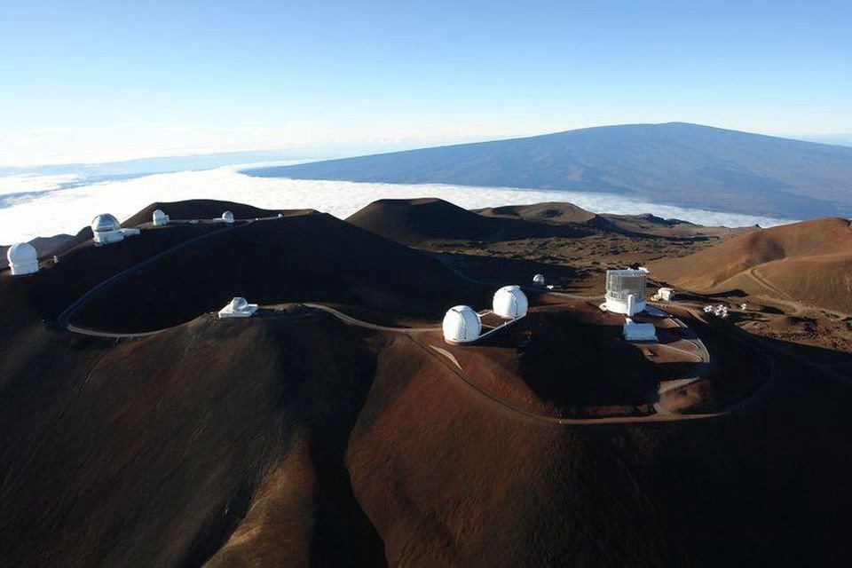 The summit of Mauna Kea contains many of the world’s most advanced, powerful telescopes. This is due to a combination of Mauna Kea’s equatorial location, high altitude, quality seeing, and the fact that it’s generally, but not always, above the cloud line.