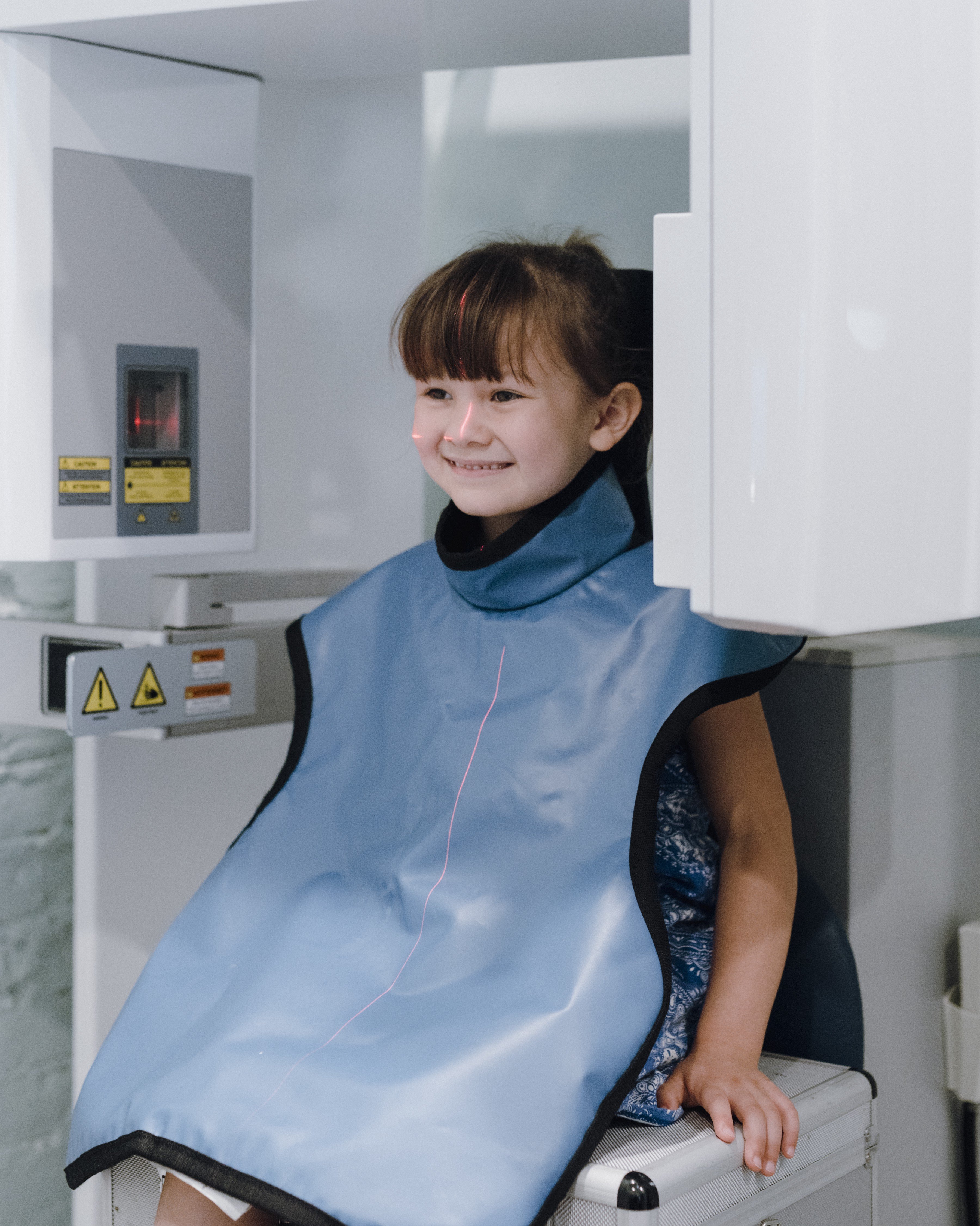 A child getting 3D x-rays at Dr. Boyd’s office. To Boyd, any time you see crowding or potential problems on the horizon, it’s a signal to expand the mouth now. Photo by Lyndon French