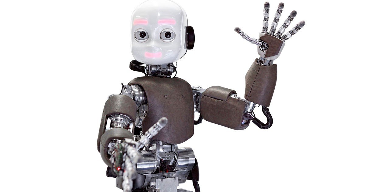 The iCub robot, an open-source child-size humanoid robot capable of crawling, grasping objects, and interacting with people.