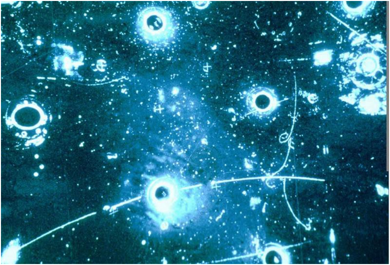 Cloud chambers, like shown in this image, reveal the presence of subatomic particles. The lines that appear in the chamber show the path the particles took. Credit to CERN.